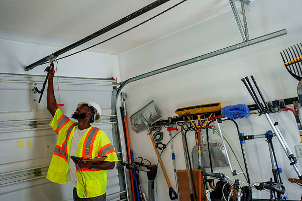 Professional Garage Door Panel Replacement technician working in Spokane County County, WA
